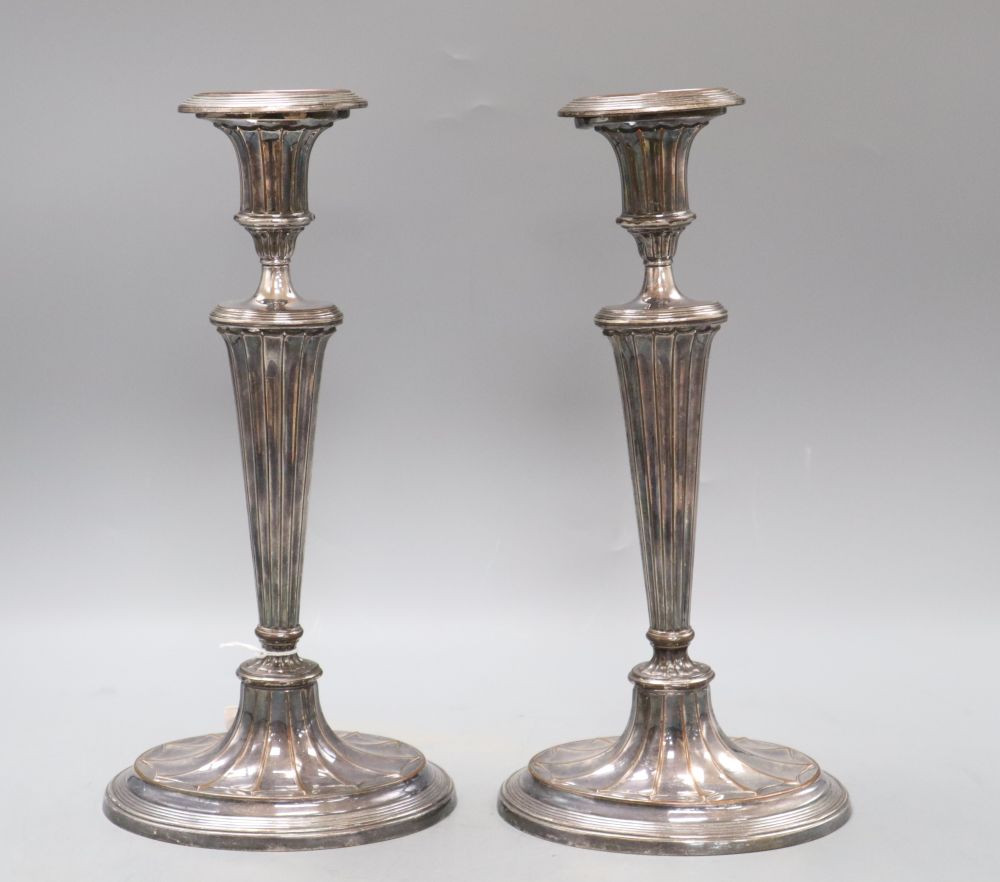 A pair of late 19th / early 20th century Old Sheffield plate candlesticks, height 31cm